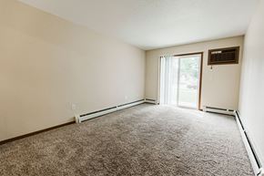 Grand Forks apartment for rent - Grand Forks, ND Grandview II Apartments. A living room with a glass sliding door