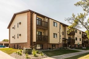 Grand Forks apartment for rent - Grand Forks, ND Library Lane Apartments. Exterior of the three level building