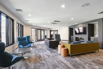 The edge of uptown apartments | community room lounge