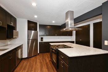 The edge of uptown apartments | community room kitchen
