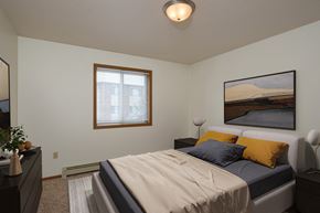 Fargo apartment for rent - Fargo, ND Park Circle Apartments. a bedroom with a bed and a dresser