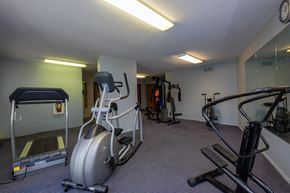 Fargo apartment for rent - a gym with treadmills and other exercise equipment. Fargo, ND South Pointe Apartments