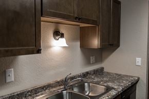 Grand Forks apartment for rent - Grand Forks, ND Sunview Apartments. A close up of a sink with a light above it.