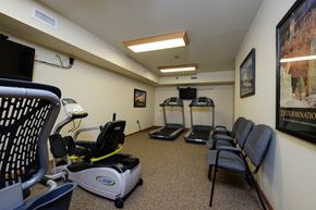 Fargo apartment for rent - a fitness room with chairs. Fargo, ND Crossroads Apartments