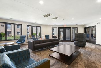The edge of uptown apartments | community room lounge area