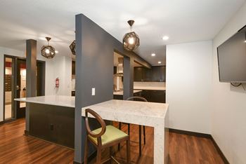 The edge of uptown apartments | community room