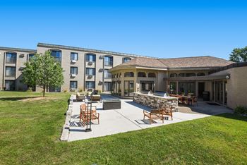 The edge of uptown apartments | patio & grill