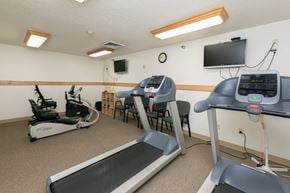 Fargo apartment for rent - a fitness center with treadmills. Fargo, ND Sunrise North