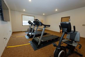 Fargo apartment for rent - a fitness room with equipment. Fargo, ND North Sky I Apartments