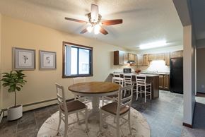 Bismarck apartment for rent - a dining room with a table and chairs. Bismarck, ND Newgate Apartments