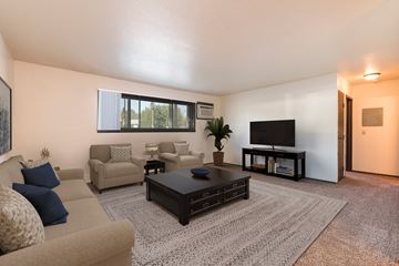 Bismarck apartment for rent - the living room of our apartments with a couch and a coffee table