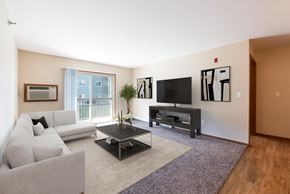 Bismarck apartment for rent - Bright Living Room Area at Stonefield Apartments in Bismarck, ND