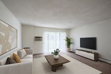 Coon Rapids apartment for rent - a living room with a couch and a coffee table