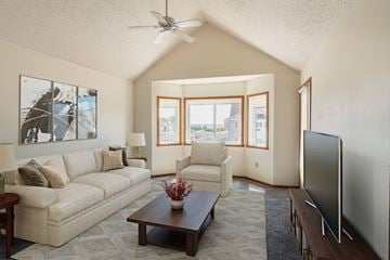 Fargo apartment for rent - a living room with a couch and a coffee table