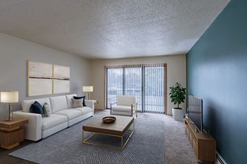 Fargo apartment for rent - a living room with a couch and a table