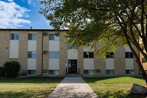 Fargo apartment for rent - an apartment building with a sidewalk in front of it. Fargo, ND Brookfield Apartments