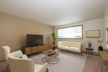 Fargo apartment for rent - a living room with a couch and a tv