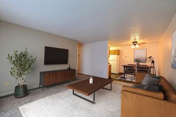 Fargo apartment for rent - a living room with a couch and a coffee table