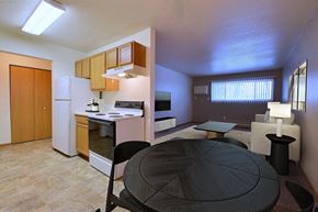 Fargo apartment for rent - Fargo, ND Dakota Manor Apartments. a kitchen and dining area in a 555 waverly unit