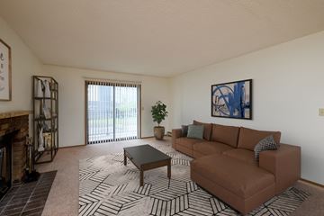 Fargo apartment for rent - the living room of an apartment with a couch and a coffee table