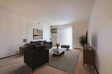 West Fargo apartment for rent - a living room with a couch and a coffee table
