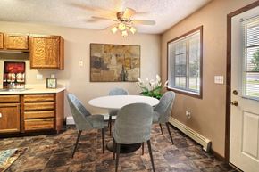 West Fargo townhouse for rent - Fargo, ND Foxboro Townhomes. a dining room with a table and chairs
