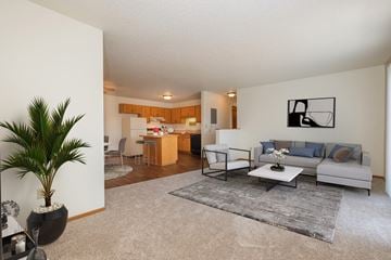 Fargo apartment for rent - a living room with a couch and a table