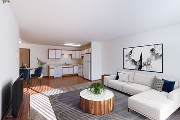 West Fargo apartment for rent - a living room with a white couch and a table