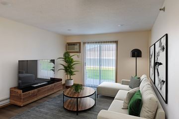 West Fargo apartment for rent - a living room with a couch and a table and a television
