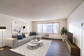 Fargo apartment for rent - a living room with a couch and a coffee table. Fargo, ND North Manor Apartments
