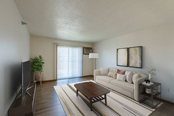 West Fargo apartment for rent - a living room with a couch and a coffee table