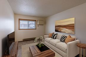 Fargo apartment for rent - a living room with a couch and a coffee table. Fargo, ND Parkwood East and West Apartments