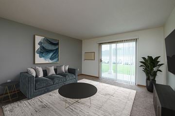Fargo apartment for rent - a living room with a couch and a coffee table