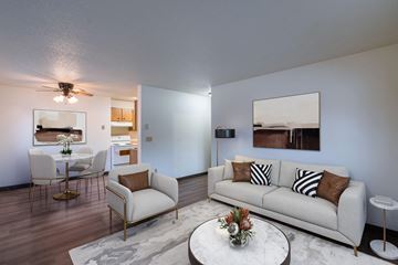 Fargo apartment for rent - a living room with a couch and a table