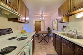 West Fargo apartment for rent - Fargo, ND Saddlebrook Apartments. a kitchen with a stove top oven next to a sink