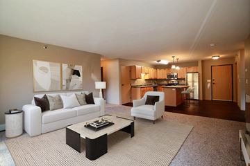 Fargo apartment for rent - a living room with a couch and a table