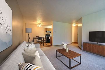 Fargo apartment for rent - a living room with a couch and a table