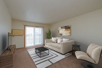 Moorhead apartment for rent - the living room of an apartment with a couch and a coffee table
