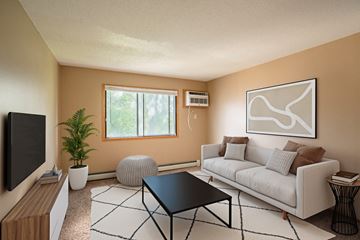 Fargo apartment for rent - a living room with a white couch and a television
