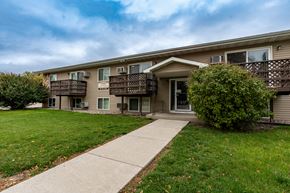 Grand Forks apartment for rent - Grand Forks, ND Autumn Apartments. The exterior of a two level apartment building.