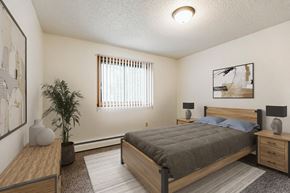 Grand Forks apartment for rent - Grand Forks, Chandler 1802 Apartments. A bedroom with a bed and two nightstands with a window
