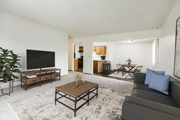 Grand Forks apartment for rent - our apartments offer a living room with a couch and a tv