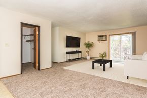 Grand Forks apartment for rent - Grand Forks, ND Grandview I Apartments. a living room with a white couch and a black coffee table