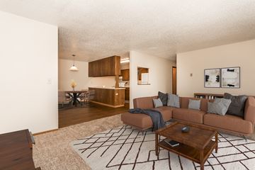Grand Forks apartment for rent - the view of a living room with a couch and a table