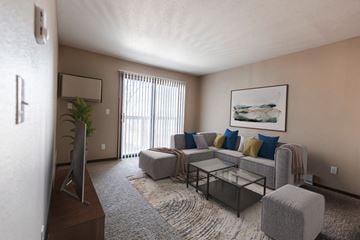 Grand Forks apartment for rent - the living room of an apartment with a couch and a coffee table
