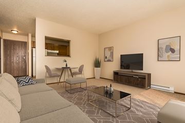 Grand Forks apartment for rent - a living room with a couch and a table and a television