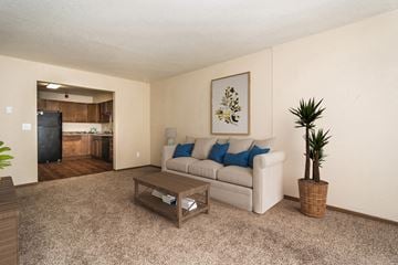 Grand Forks apartment for rent - a living room with a couch and a coffee table