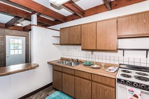 Grand Forks apartment for rent - Grand Forks, ND Washington Apartments. A kitchen with a stove and a sink