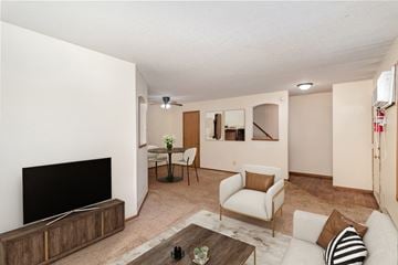 Hutchinson townhouse for rent - a living room with a couch and a tv
