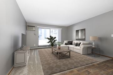Maplewood apartment for rent - a living room with a couch and a coffee table